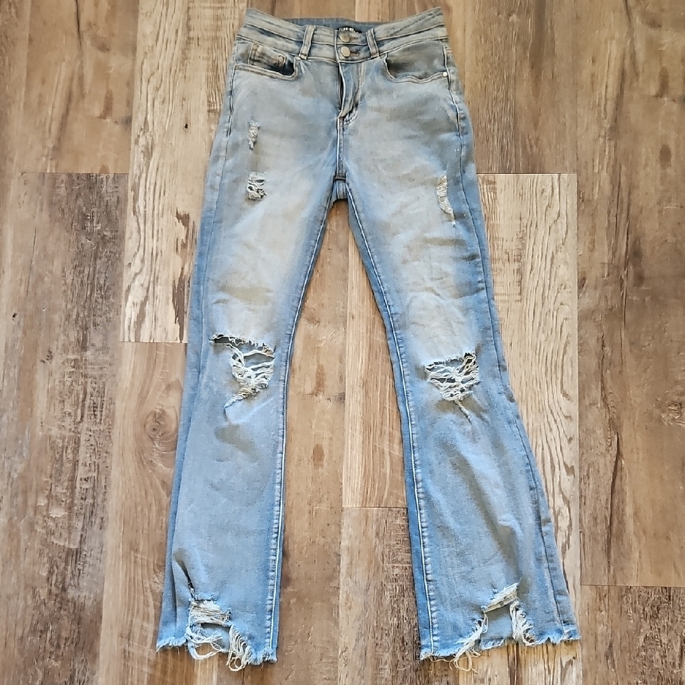 Distressed Blue Jeans